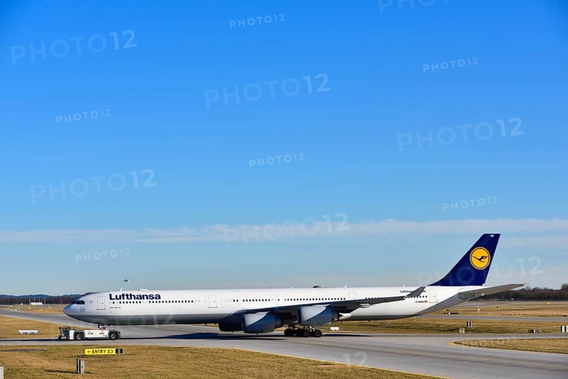 Lufthansa Airbus A340-600 with pushback truck