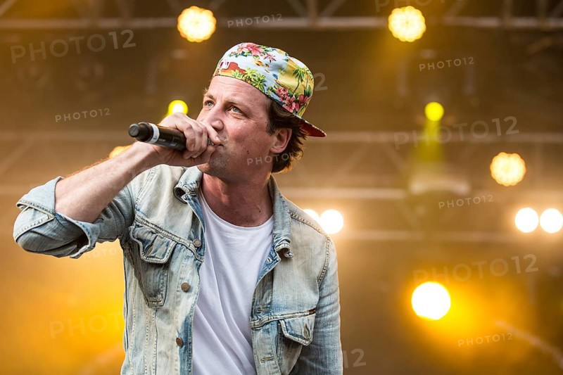 The German rapper Dendemann performing live at Heitere Open Air