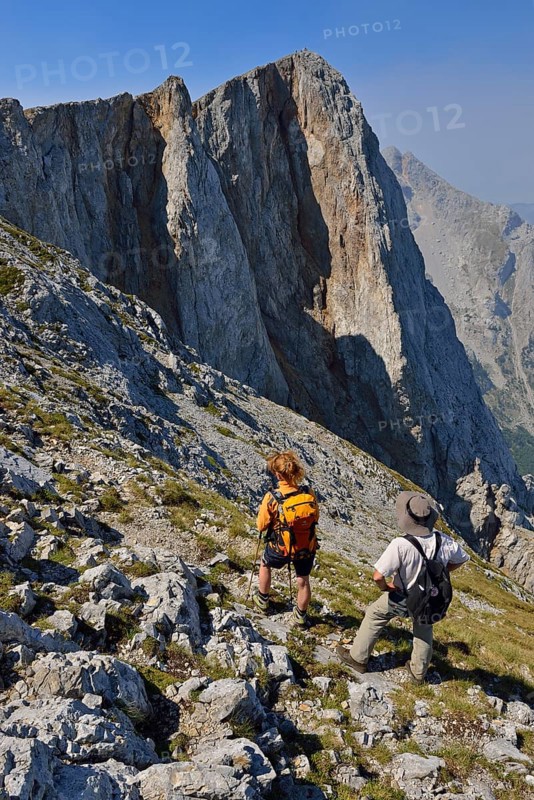 Two hikers on a trail near Kom Vasojevicki peak