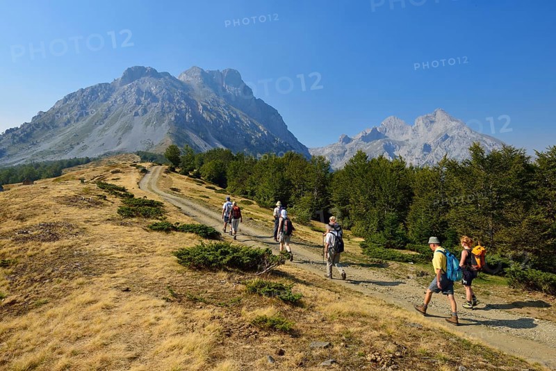 Group of hikers on a trail in the Komovi Mountains