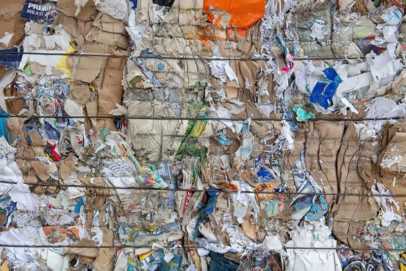 Pressed waste paper and cardboard