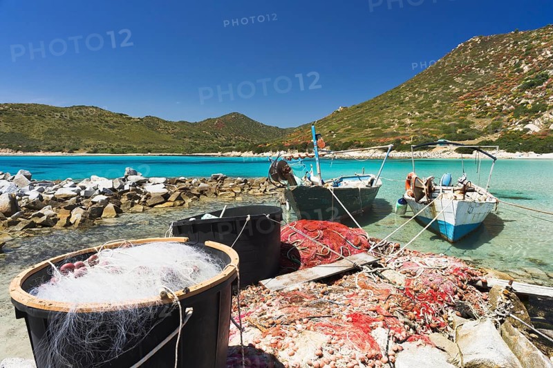 Fishing boats on the beach of Punta Molentis