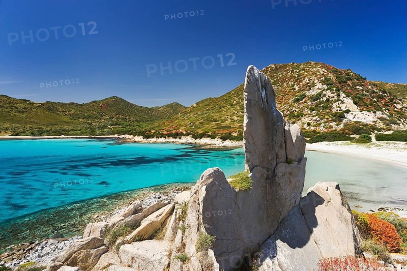 Granite pinnacle on the beach of Punta Molentis