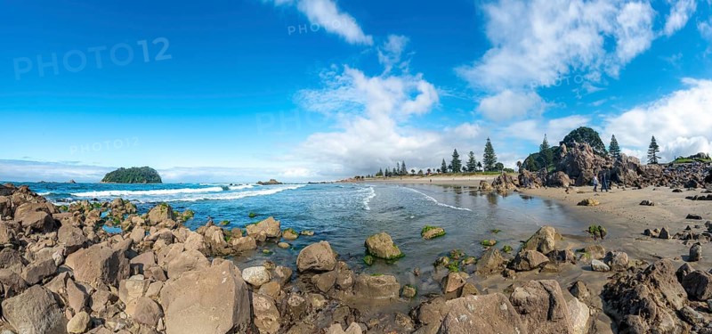 Sandy beach beach of Mount Manganui with island Motiti Island