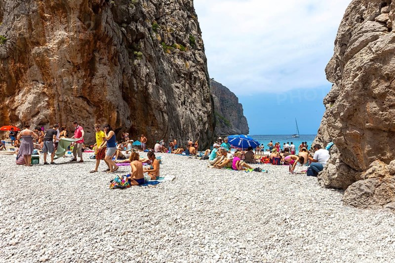 Tourists sunbathing in the Torrent de Pareis gorge