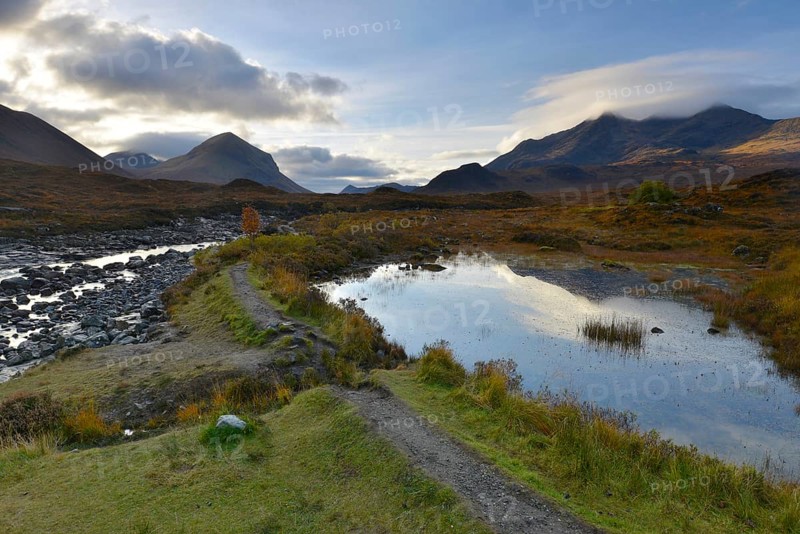 Small lake in front of the Black Cullins Mountains