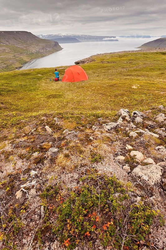 Young woman with a tent
