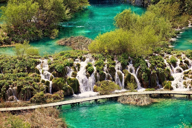 Cascades of water running over the travertine deposits between the lakes of Plitvice
