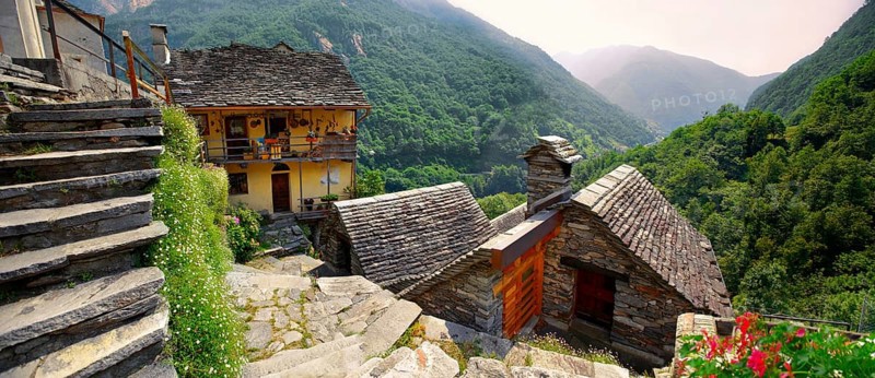 Rustic mountain peasant village of Corippo with stone houses and church