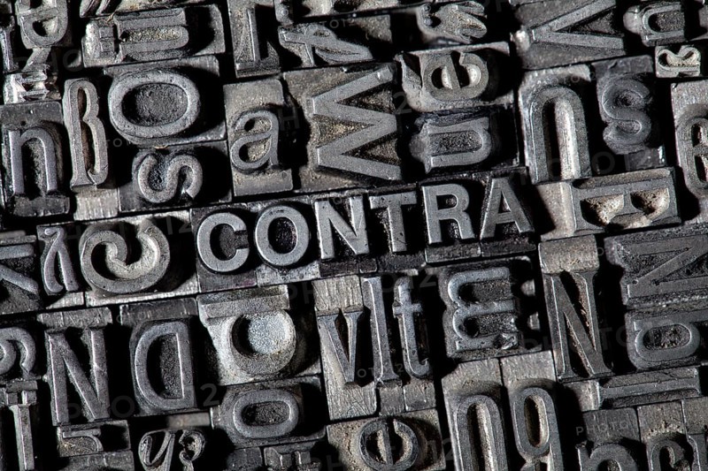 Old lead letters forming the word CONTRA