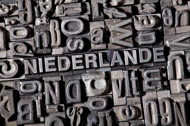 Old lead letters forming the word NIEDERLANDE