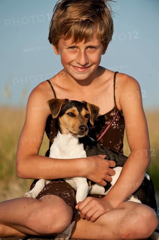 Girl and a Dansk-Svensk Gardshund or Danish-Swedish Farmdog