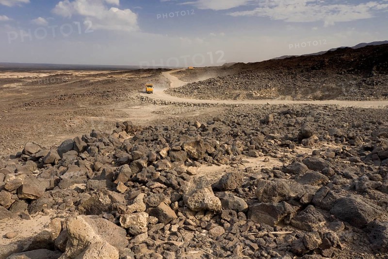 Newly built salt road leading through the landscape shaped by flood basalts near Afdera
