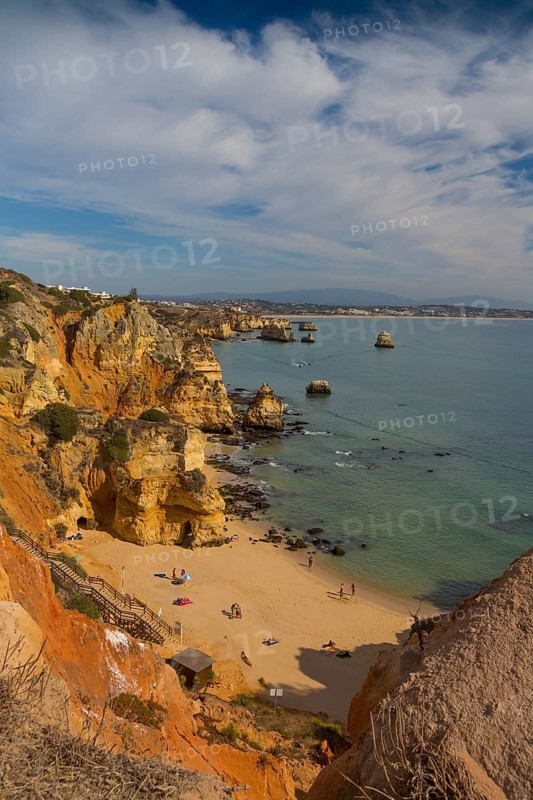 Praia do Camilo beach with Praia Dona Ana beach at back