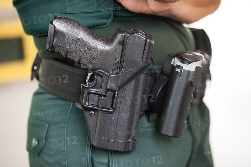Armed customs officer at immigration