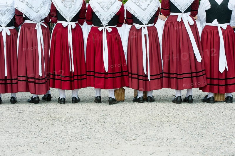 Women in traditional Bavarian costume forming a guard of honour for the entrance into the beer tent