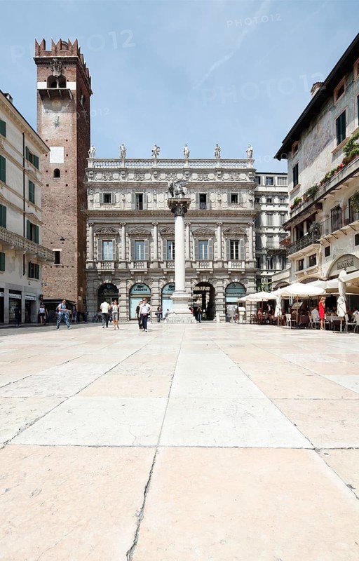 Palazzo Maffei and Torre del Gardello behind a Venetian column with the lion of St. Mark