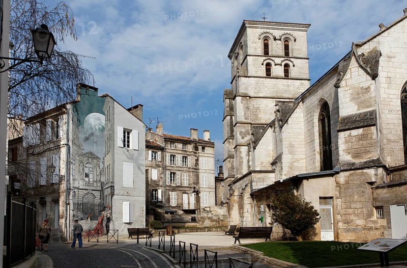 Saint Andre Church and mural Memoires du XXeme Siecle by Yslaire
