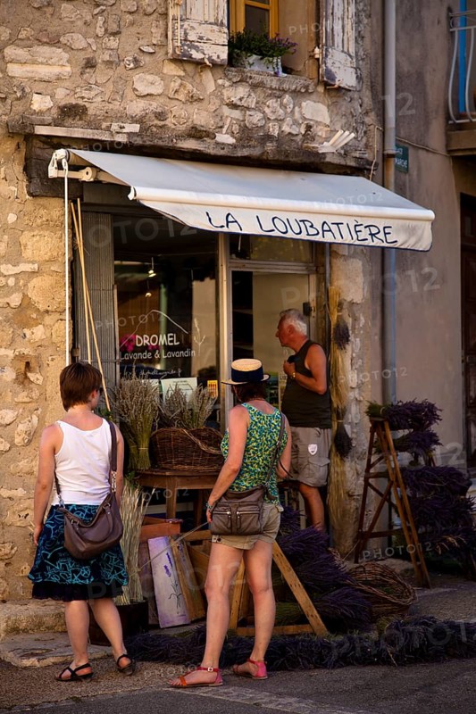 Tourists looking at display of lavender shop