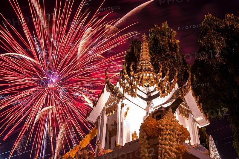 Fireworks behind a Buddhist temple