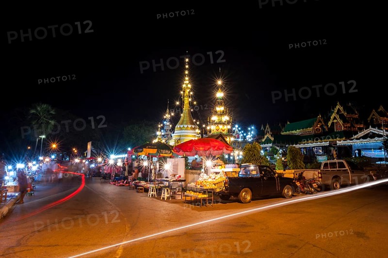 Night market outside the temple complex of Wat Jong Kham or Chong Kham and Wat Jong Klang or Chong Klang