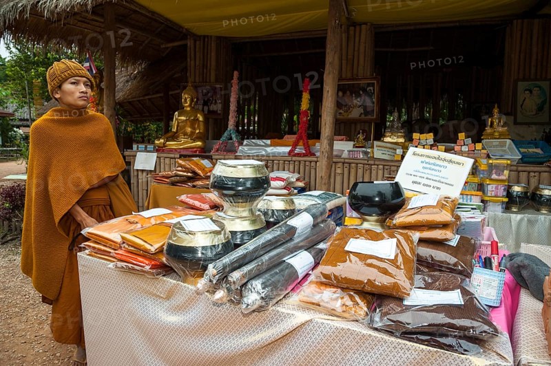 Monk at a market stall