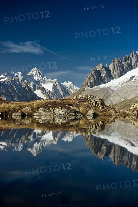 Small lake above the Aletsch Glacier and the Bernese Oberland