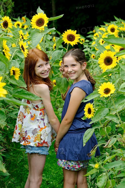 Girls in a sunflower field