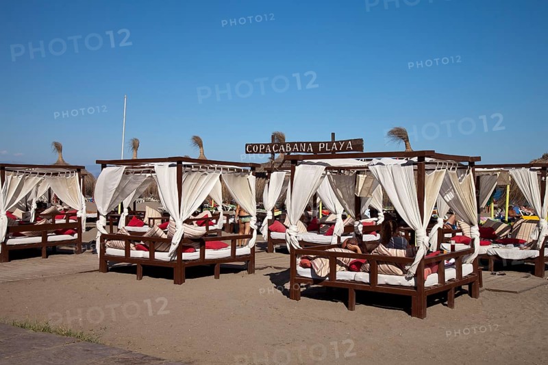 Sunbeds on the Copacabana Playa beach