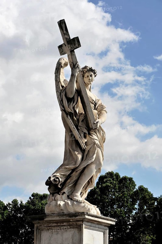 Sculpture of an angel carrying a cross