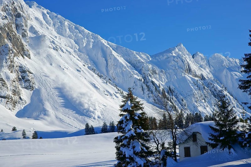 Avalanche going down at the Saentis massif in the Appenzell Alps