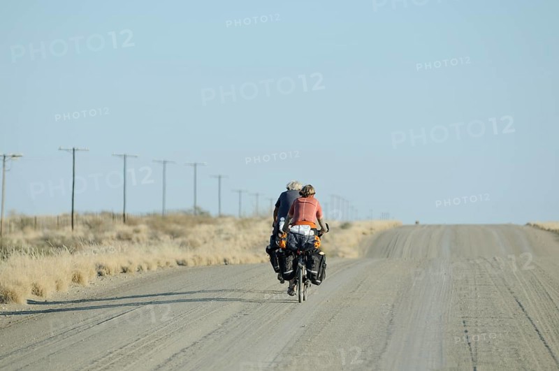 Cyclists on a dusty track