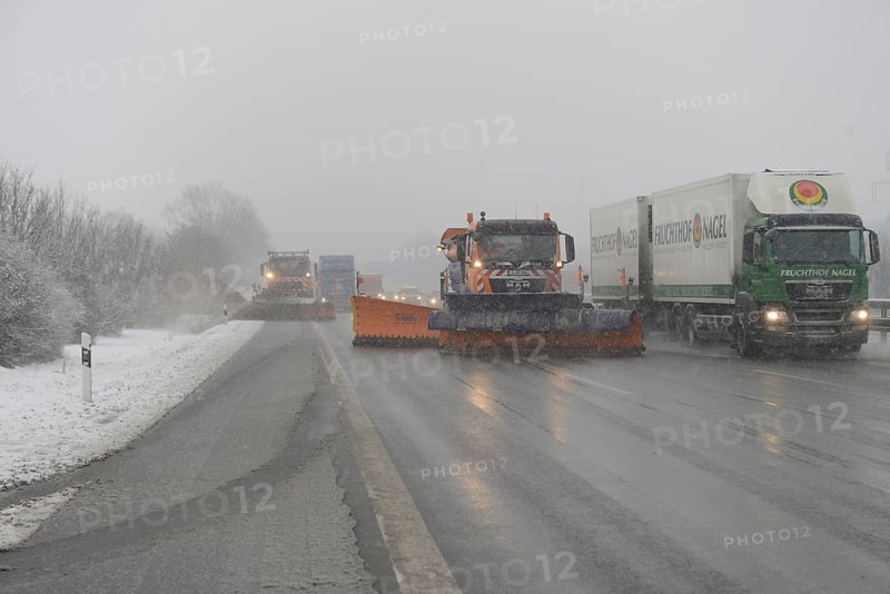 Snow-clearing vehicle from the motorway maintenance authorities in operation on the A8 motorway