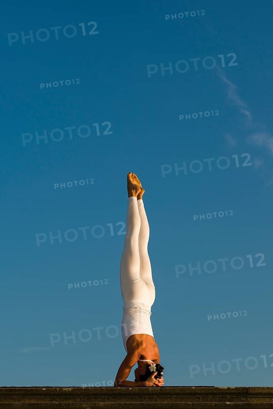 Young woman practising Hatha yoga