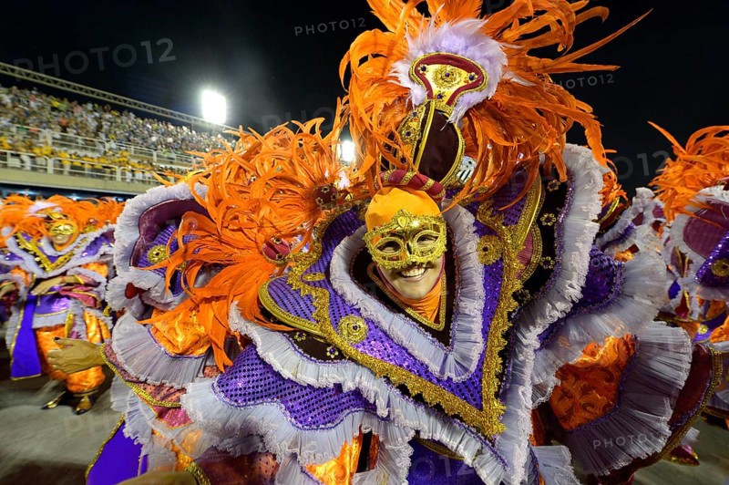 Man wearing a colourful costume