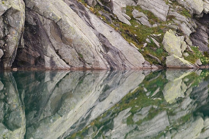 Rocks being reflected in the water