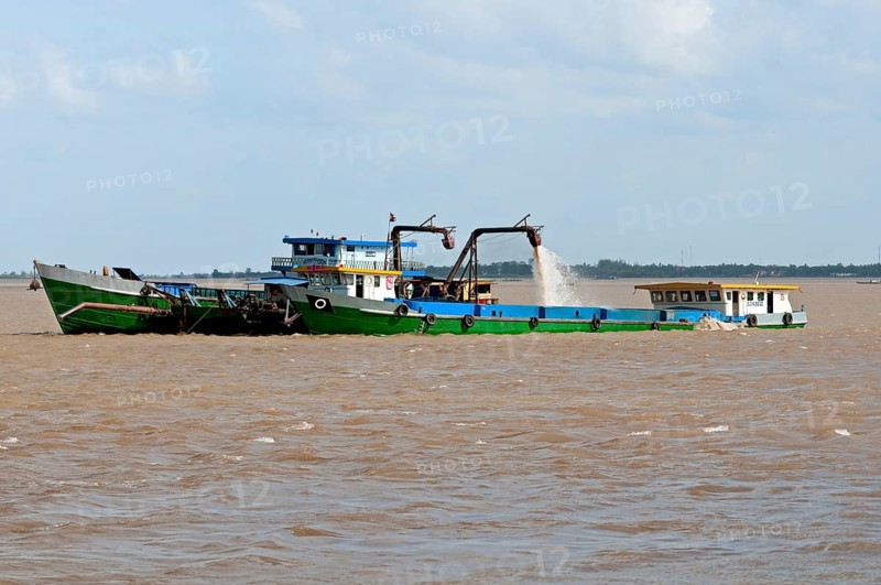 Suction dredger operating on the Mekong River