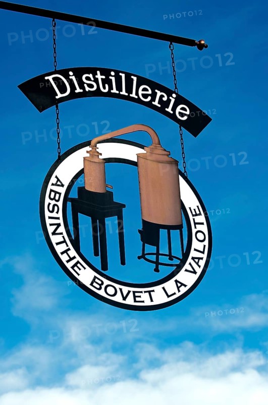 Hanging sign of the absinthe distillery Bovet La Valote