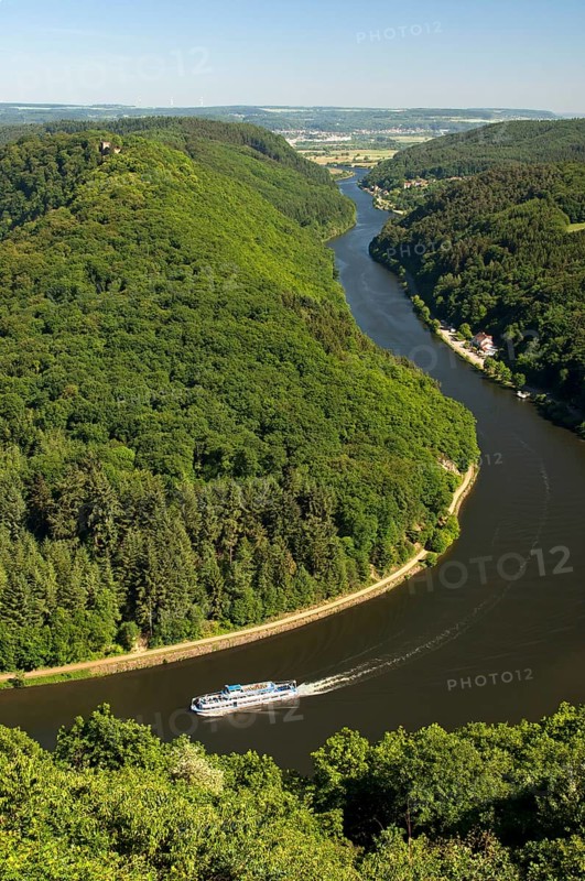 Excursion boat cruising on one arm of the big loop of the Saar river near Mettlach