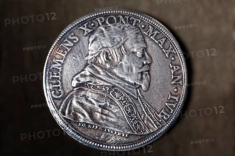 Antique silver coin with the portrait of Clement X. 1590 - 1676 or Emilio Altieri