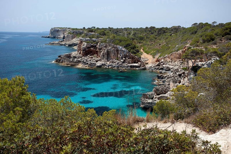 Rock-lined bay of Calo des Moro