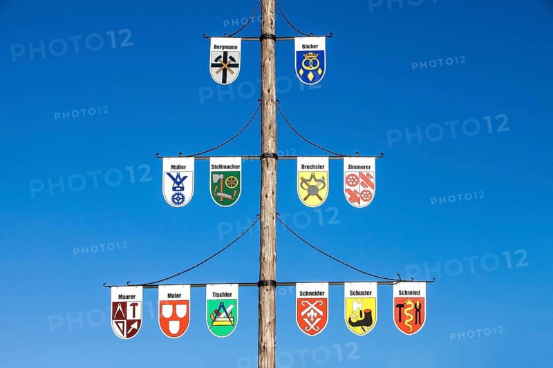 Guild pole with the emblems of all the trades of the town