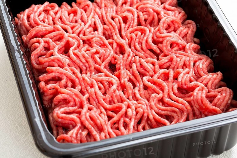 Minced meat in plastic tray.