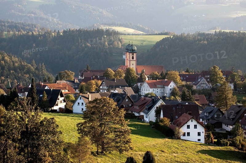 View of the village of St Maergen with the monastery church in the evening light
