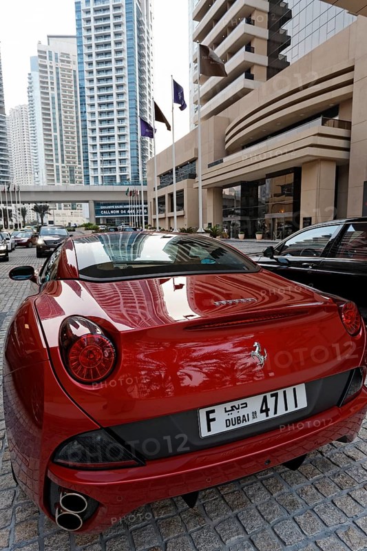 Ferrari parked in front of the luxury hotel Grosvenor House