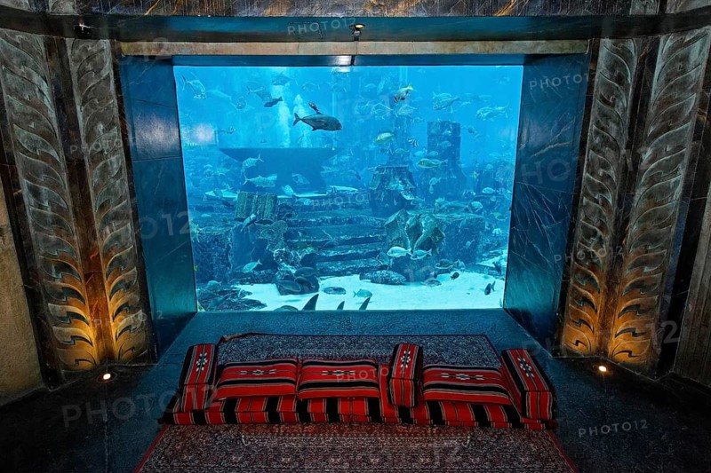 Seat in front of an aquarium in The Lost Chambers