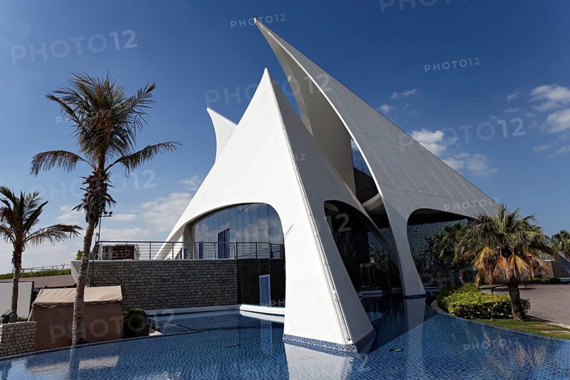 White building in the form of sails
