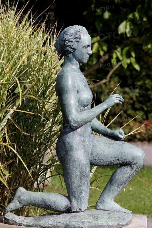 Kneeling woman