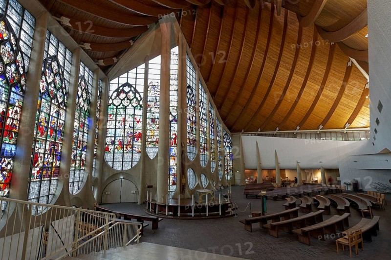 Futuristic church with historic stained glass windows