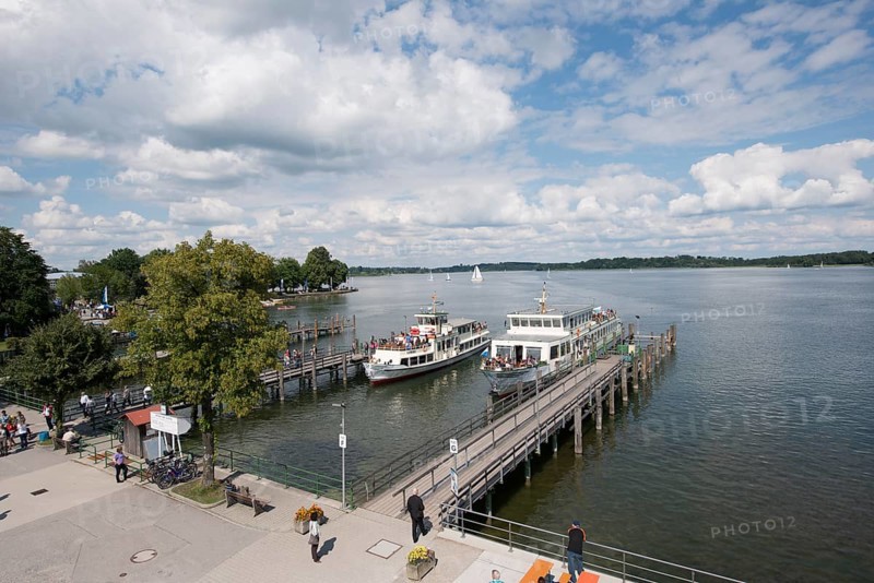 Landing stage with a steamboat on lake Chiemsee